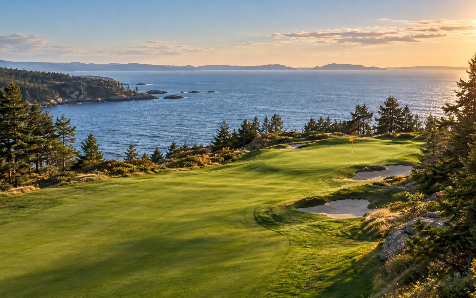 A coastal golf green with an orange flag, pines, and blue water